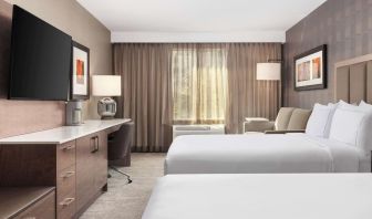 Twin day use room with TV, work desk and private bathroom  at DoubleTree By Hilton Kitchener.