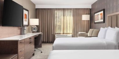 Twin day use room with TV, work desk and private bathroom  at DoubleTree By Hilton Kitchener.