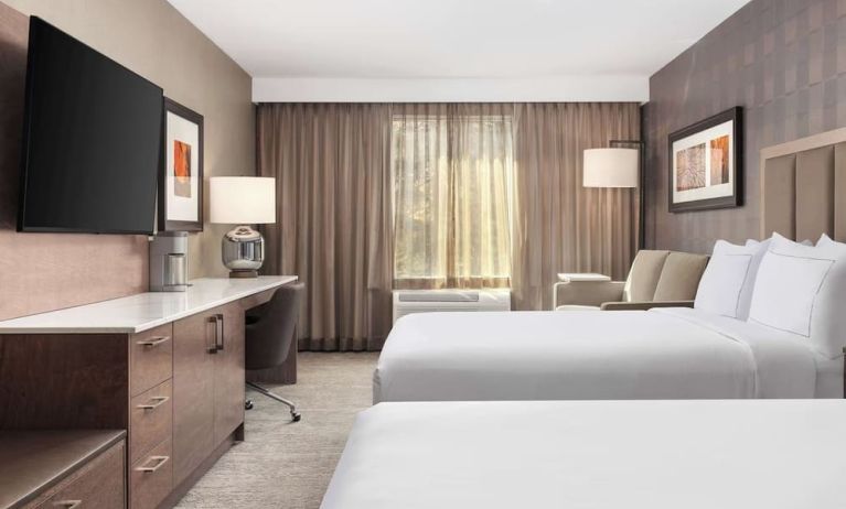 Twin day use room with TV, work desk and private bathroom  at DoubleTree By Hilton Kitchener.