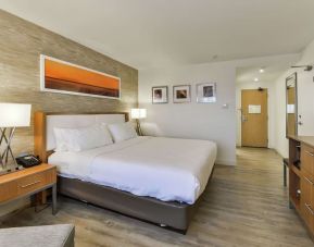 Day use room with TV, sofa and private bathroom at DoubleTree By Hilton Kitchener.