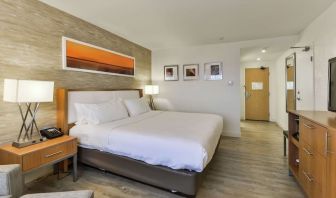 Day use room with TV, sofa and private bathroom at DoubleTree By Hilton Kitchener.