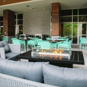 Hotel terrace with lounge area perfect for co-working at the Hilton Garden Inn Fredericton.