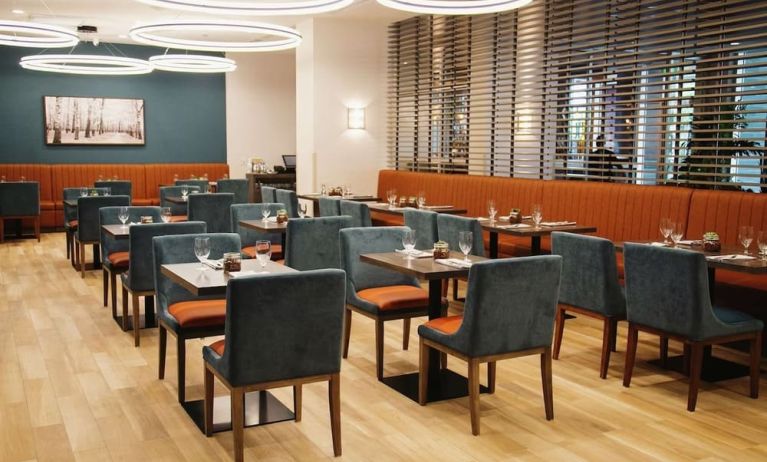 Hotel dining area with comfortable seating at the Hilton Garden Inn Fredericton.