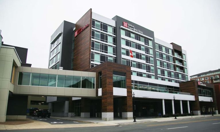 Hotel exterior and parking area at the Hilton Garden Inn Fredericton.