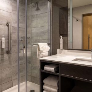 Private guest bathroom with shower and free toiletries at the Hilton Garden Inn Fredericton.