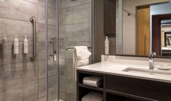 Private guest bathroom with shower and free toiletries at the Hilton Garden Inn Fredericton.