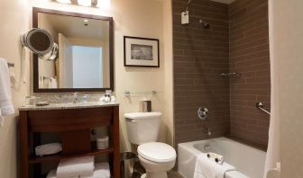 Guest bathroom with shower and tub at Fairmont Winnipeg.