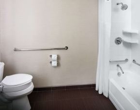 Guest bathroom with shower and tub at Hilton Albany.
