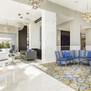 Hotel lobby with lounge area perfect for co-working at the Embassy Suites By Hilton Toronto Airport.