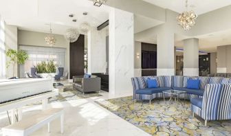 Hotel lobby with lounge area perfect for co-working at the Embassy Suites By Hilton Toronto Airport.