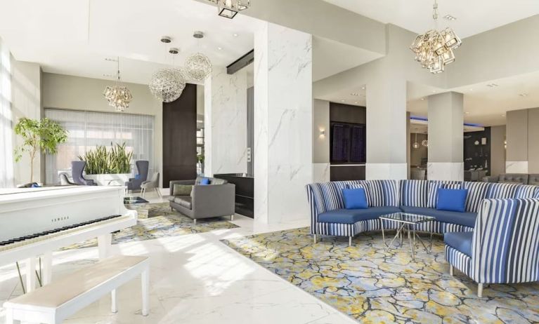 Hotel lobby with lounge area perfect for co-working at the Embassy Suites By Hilton Toronto Airport.