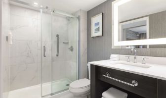 Private guest bathroom with shower at the Embassy Suites By Hilton Toronto Airport.