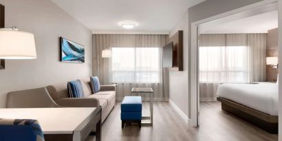 Day use studio suite with living room and work station at the Embassy Suites By Hilton Toronto Airport.