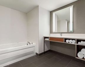 Private guest bathroom with tub at the Hilton Garden Inn Kitchener/Cambridge.