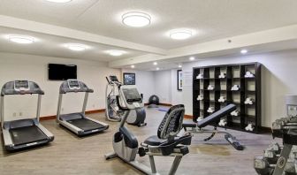 Fully equipped fitness center at the Holiday Inn Oakville Centre.