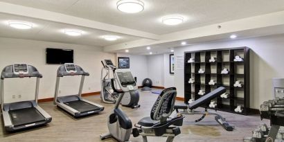 Fully equipped fitness center at the Holiday Inn Oakville Centre.