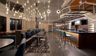 Dining area with lounge sitting perfect for co-working at the Four Points By Sheraton St Catharines Niagara Suites.