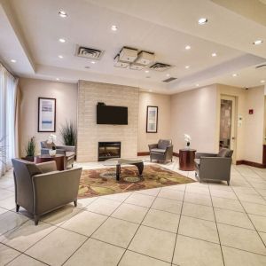 Hotel lobby with lounge area at Amenida Residences.