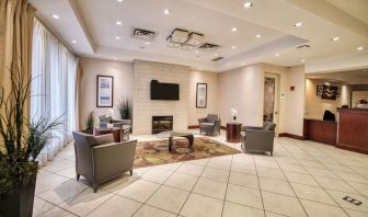 Hotel lobby with lounge area at Amenida Residences.