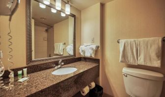 Private guest bathroom with shower and free toiletries at Amenida Residences.