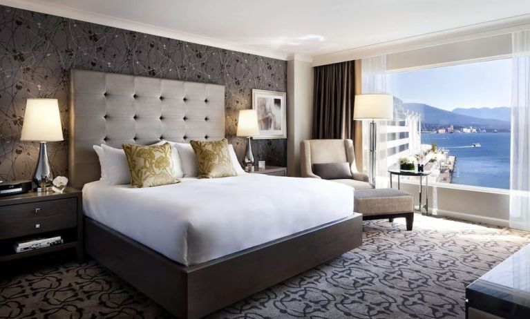 Day use room with TV, work desk, sofa and private bathroom at the Fairmont Waterfront.