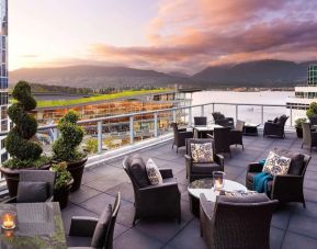 Hotel terrace with comfortable seating perfect for co-working at the Fairmont Waterfront.