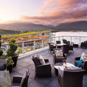 Hotel terrace with comfortable seating perfect for co-working at the Fairmont Waterfront.