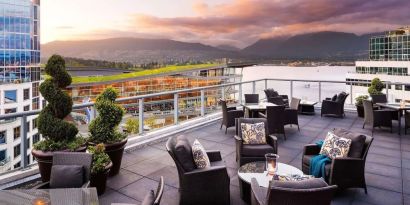 Hotel terrace with comfortable seating perfect for co-working at the Fairmont Waterfront.