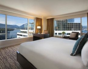 Day use room with work desk, sofa and private bathrom at the Fairmont Waterfront.