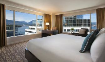 Day use room with work desk, sofa and private bathrom at the Fairmont Waterfront.