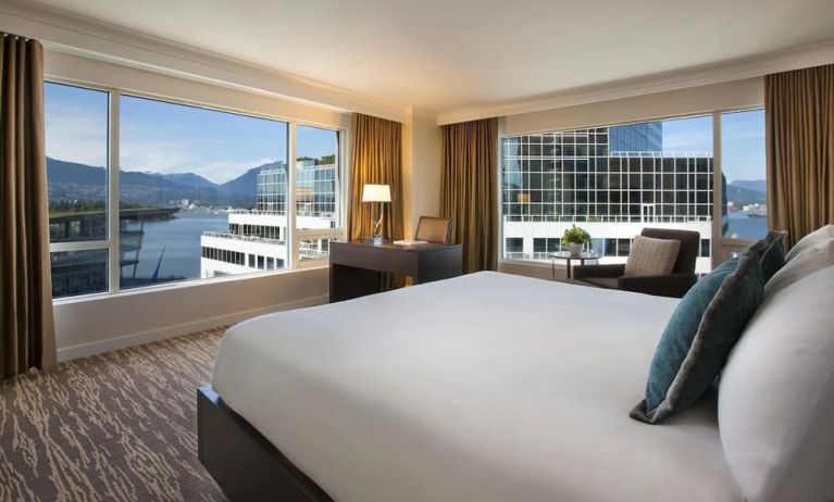 Day use room with work desk, sofa and private bathrom at the Fairmont Waterfront.