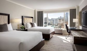 Day use twin room with TV, work desk and private bathroom at the Fairmont Waterfront.