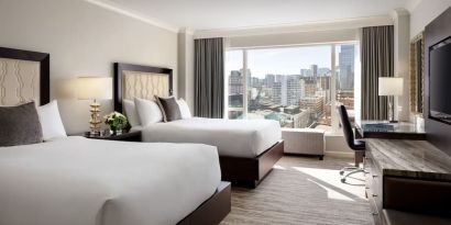 Day use twin room with TV, work desk and private bathroom at the Fairmont Waterfront.