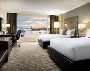 Day use twin room with TV, work desk and private bathroom at the Fairmont Waterfront.