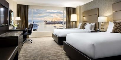 Day use twin room with TV, work desk and private bathroom at the Fairmont Waterfront.