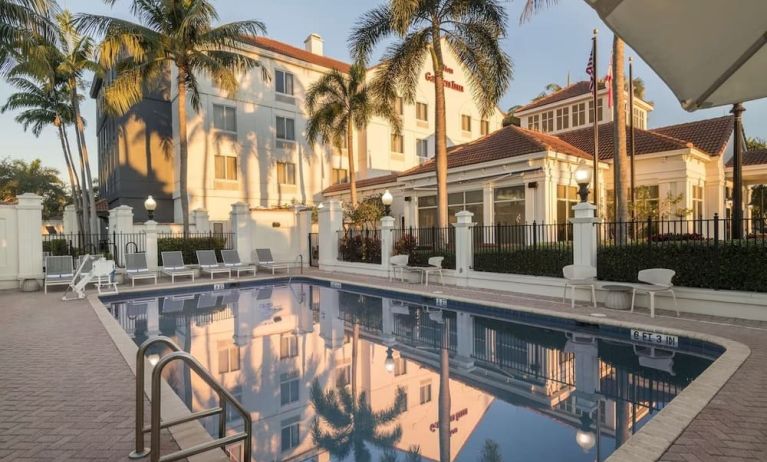 Refreshing outdoor pool at Hilton Garden Inn Boca Raton.