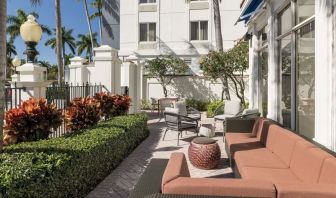 Outdoor seats available at Hilton Garden Inn Boca Raton.