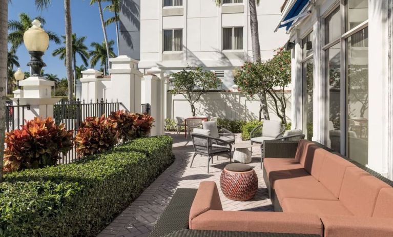 Outdoor seats available at Hilton Garden Inn Boca Raton.