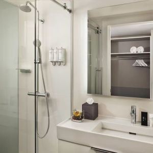 Guest bathroom with shower at Innside By Melia New York Nomad.