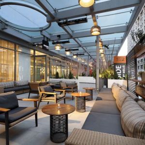 Veranda with ample seats at Innside By Melia New York Nomad.