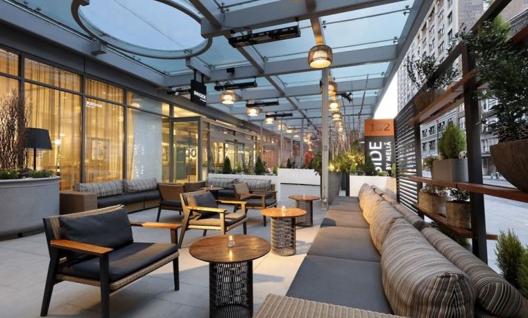 Veranda with ample seats at Innside By Melia New York Nomad.