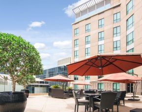 Balcony with ample seating at Radisson Blu Hotel Dubai Media City.