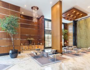 Lobby and coworking lounge at Radisson Blu Hotel Dubai Media City.