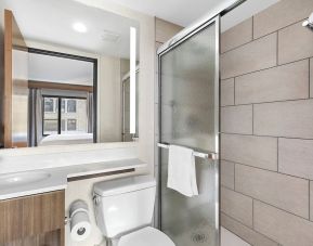 Guest bathroom with shower at Holiday Inn Manhattan 6th Ave - Chelsea.