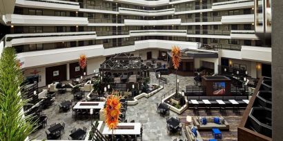 Dining area perfect for coworking at Embassy Suites By Hilton LAX Airport North.