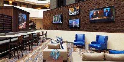 Lobby and coworking lounge at Embassy Suites By Hilton LAX Airport North.