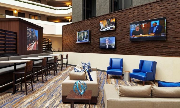 Lobby and coworking lounge at Embassy Suites By Hilton LAX Airport North.