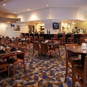 Dining area perfect for coworking at Embassy Suites By Hilton LAX Airport North.