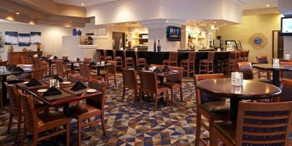 Dining area perfect for coworking at Embassy Suites By Hilton LAX Airport North.