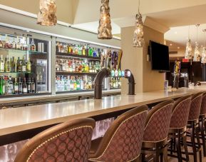 Hotel bar with lounge area at Holiday Inn Toronto International Airport.